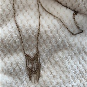 Long gold necklace